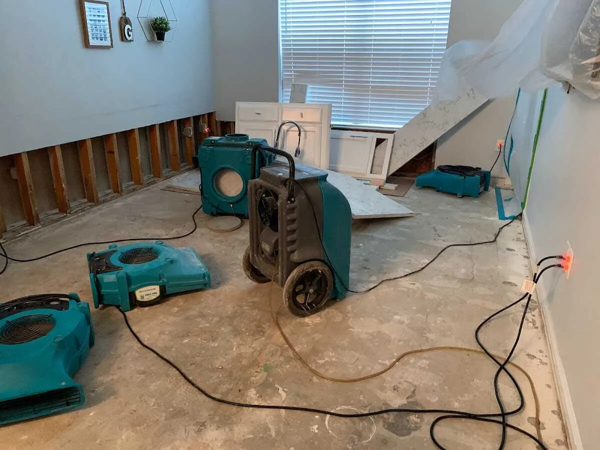 Dehumidifier in flood-cut room for Water Damage Restoration in Rome